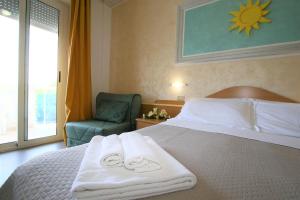 Quadruple Room with Balcony room in Hotel De Amicis