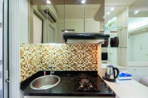 Comfy 2BR Bassura City Apartment near Bassura Mall By Travelio
