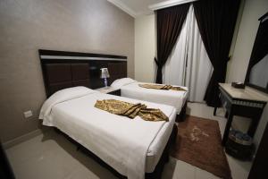 Two-Bedroom Suite with Sea View room in Wahaj Hotel Apartments 2