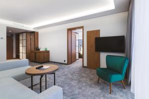 Deluxe Triple Room with a double bed or two twin beds room in Green Mountain 5* Hotel
