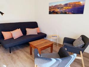 Appartements Le 13 : photos des chambres