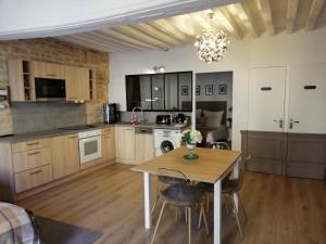 Appartements Le Petit Faubourg : photos des chambres