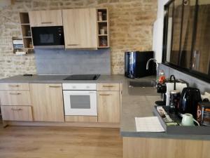 Appartements Le Petit Faubourg : photos des chambres