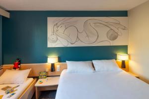 Hotels ibis Lille Villeneuve-d'Ascq Grand Stade : photos des chambres