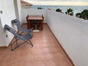 Appartements Les pieds dans l'eau en Corse ! : photos des chambres