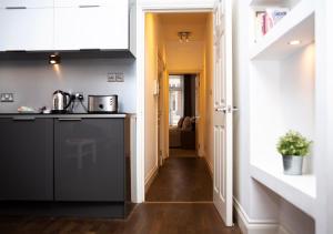 Apt 1, Trafalgar Square 1st Floor by Indigo Flats