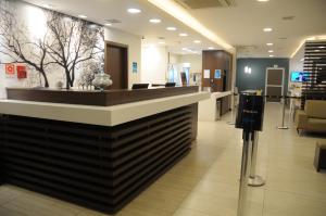 Golden Tower Aeroporto - Lizz - by Fênix Hotéis