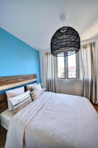 Appartements Apparts Seasons - Saint Etienne Centre - Gare Chateaucreux : photos des chambres