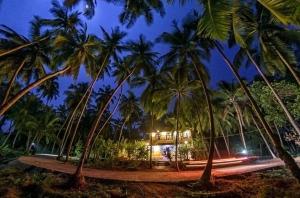 SaffronStays Suvarna Sangam riverfront villa with boat rides, candlelight dinners & backwater views in Udupi