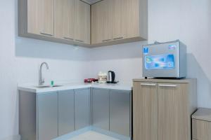 Pool View Brooklyn Alam Sutera Studio Apartment near IKEA By Travelio