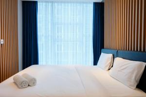 Chic 1BR Brooklyn Alam Sutera Apartment near IKEA By Travelio