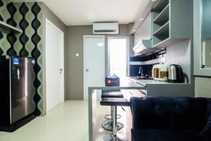 Modern and Comfort 2BR Bassura City Apartment By Travelio