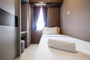 Modern and Comfort 2BR Bassura City Apartment By Travelio