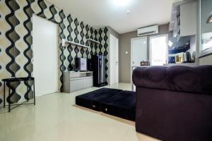 Modern and Comfort 2BR Bassura City Apartment By Travelio