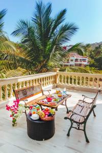 SaffronStays La Casa Maestro - Spanish 4BR villa with terrace plunge pool, coconut groves & mountain views, featured in Condé Nast