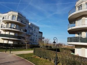 Appartements Appartement avec rez de jardin a Disneyland : photos des chambres