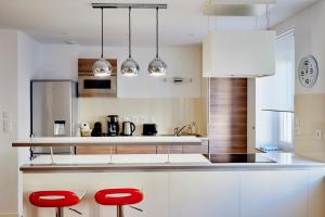 Les Appartements Saint-Michel - centre-ville 2 chambres 90m2 avec garage : photos des chambres