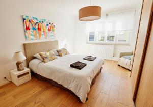 Les Appartements Saint-Michel - centre-ville 2 chambres 90m2 avec garage : photos des chambres