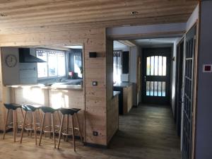 Appartements Chalet les 4 saisons : photos des chambres