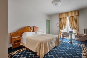 Classic Triple Room with Balcony room in Hotel Terme Venezia