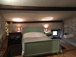 Sejours chez l'habitant La grange : Chambre Deluxe (2 Adultes + 1 Enfant)
