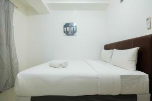 Cozy 2BR Signature Park Grande MT Haryono By Travelio