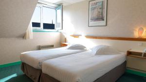 Hotels Les Bains de Mer Riviera Bretonne : photos des chambres