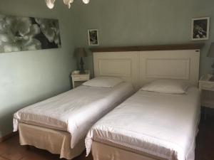 B&B / Chambres d'hotes La Ferme du petit Segries Bed and Breakfast : photos des chambres