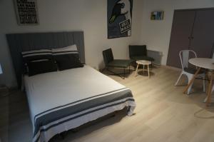 Appartements Studio typique et cosy climatise. : photos des chambres