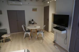 Appartements Studio typique et cosy climatise. : photos des chambres