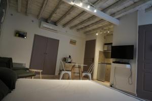 Appartements Studio typique et cosy climatise. : photos des chambres