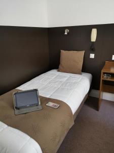 Hotels Hotel Notre Dame de la Sarte : photos des chambres