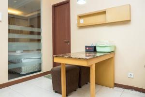 Spacious Studio Room at Grand Setiabudi Apartment By Travelio