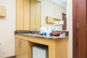 Spacious Studio Room at Grand Setiabudi Apartment By Travelio