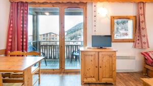 Appartements Vacanceole - Residence Les Chalets et Balcons De La Vanoise : photos des chambres