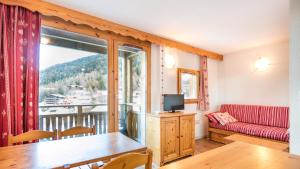 Appartements Vacanceole - Residence Les Chalets et Balcons De La Vanoise : photos des chambres