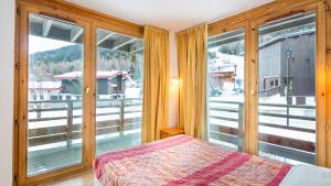 Appartements Vacanceole - Residence Les Chalets et Balcons De La Vanoise : photos des chambres