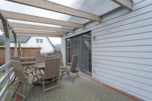 Ferienhaus Carstensen - gemütlich und rollstuhlfreundlich eingerichtetes Ferienhaus mit Terrasse