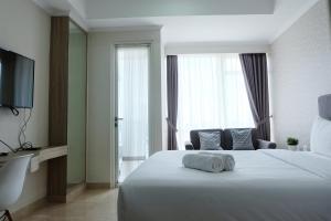 Comfy Studio Menteng Park Apartment By Travelio