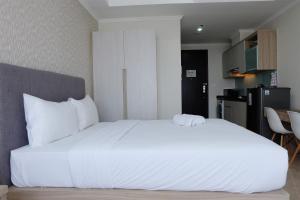 Comfy Studio Menteng Park Apartment By Travelio