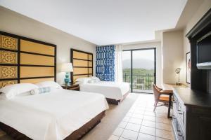 Queen Room with Two Queen Beds and Rainforest View - Non-Smoking room in Wyndham Grand Rio Mar Puerto Rico Golf & Beach Resort