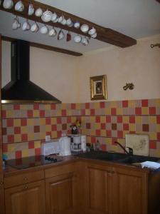 Appartements Gite de charme sur les remparts : photos des chambres