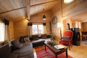 Chalets Sous les Ecotagnes : photos des chambres