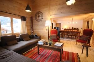 Chalets Sous les Ecotagnes : photos des chambres