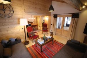 Chalets Sous les Ecotagnes : photos des chambres