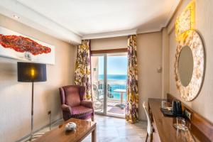 Family Junior Suite with Sea View and Balcony (2 Adults + 2 Children) room in Hotel Balcón de Europa