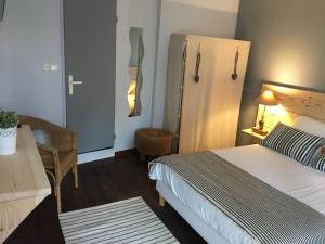 Hotels Le Pavillon Bleu : photos des chambres