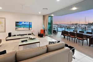 Pavillion 3 Absolute Waterfront 4 Bedroom 2 Lounge Room and Golf Buggy