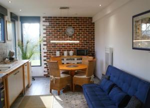 Appartements Le Gite du Fort : Appartement - Vue sur Jardin