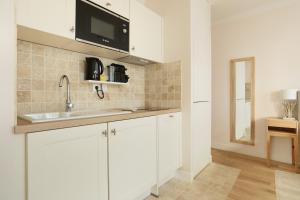 Appartements Residence Grands Boulevards by Studio prestige : photos des chambres